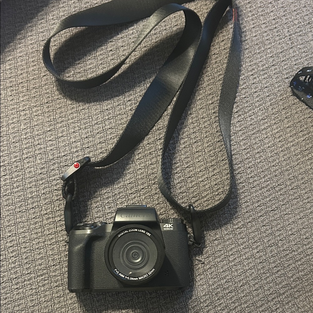 Canon Black 4K Digital Camera with Neck Strap brand new used once